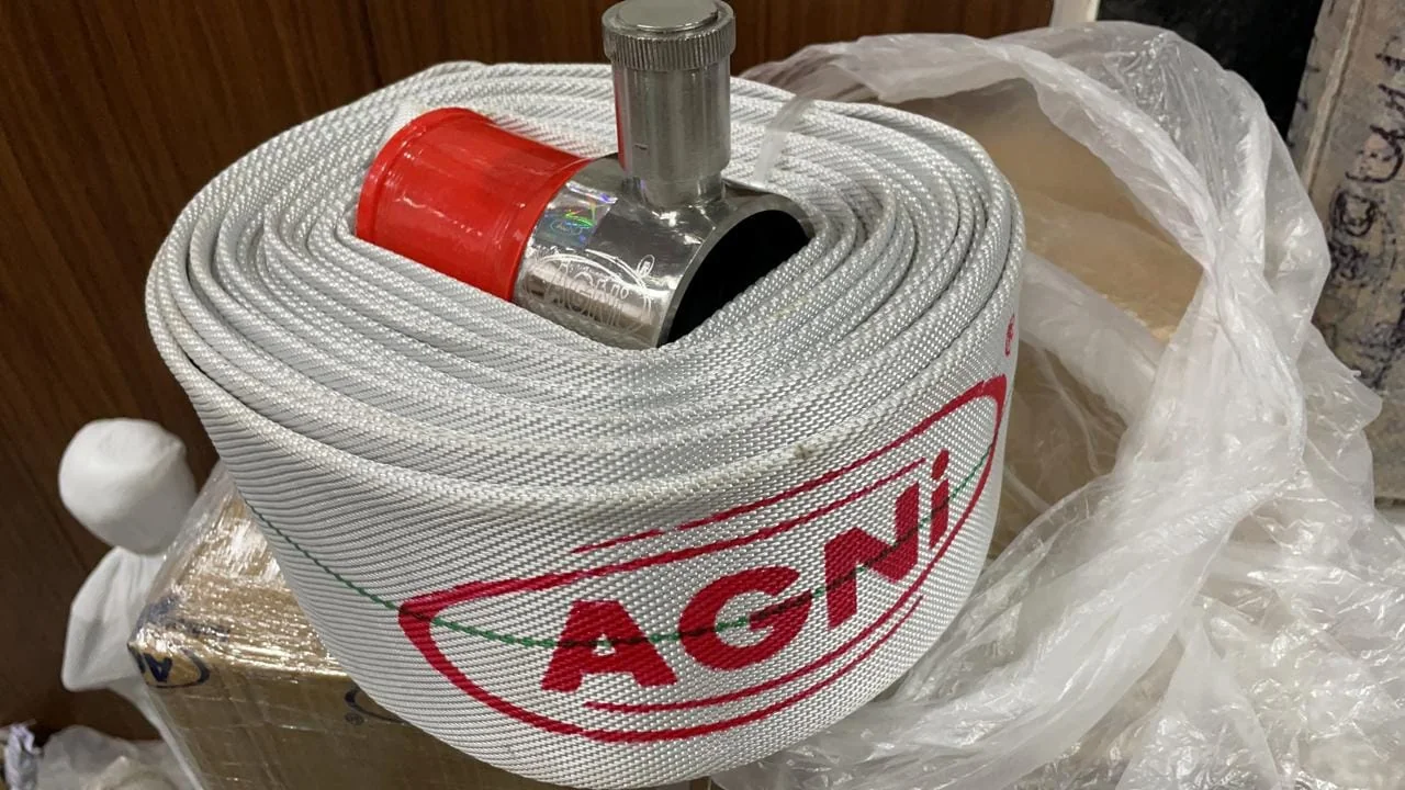 Fire hose with nozzle coupling