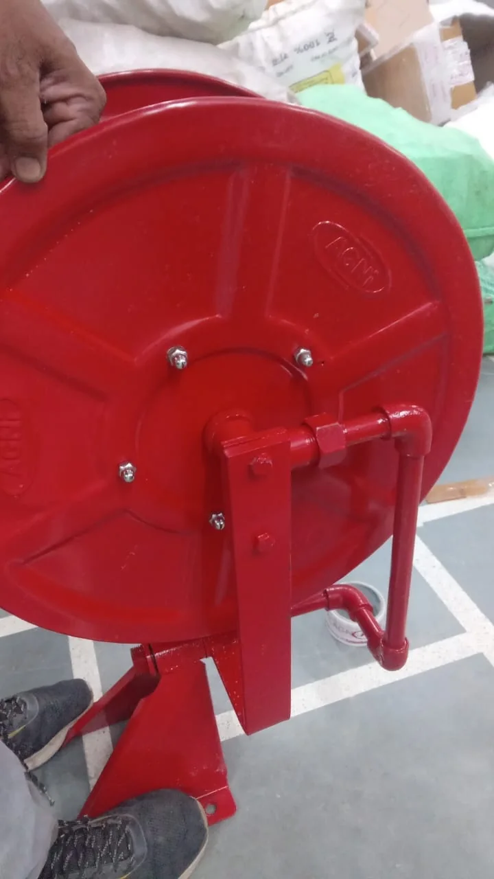 Back view of red fire hose reel drum