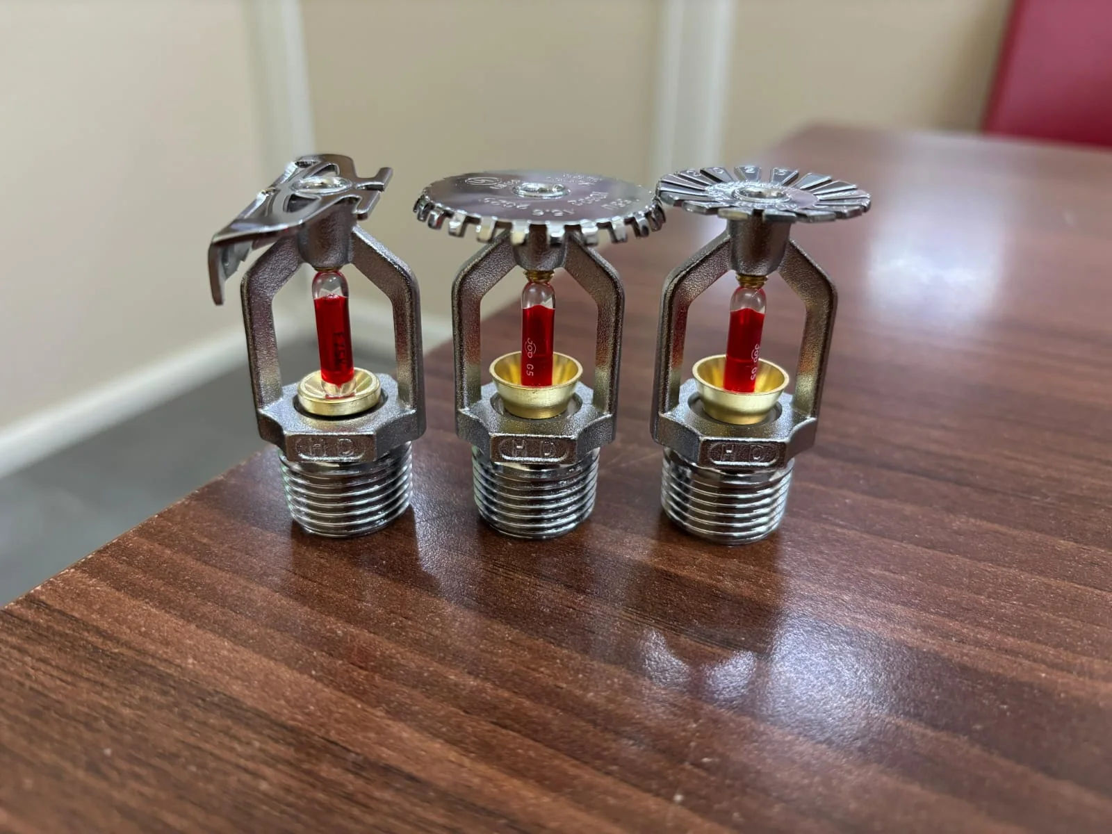 Three fire sprinkler heads